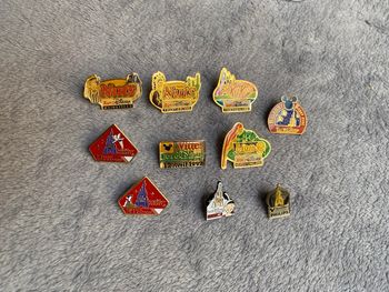 Lot de 10 pin’s broche euro Disney Buitoni, kitkat, nuts, philips, lion, kodak et vittel