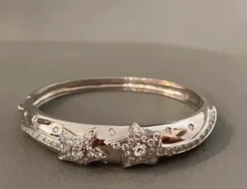 Bracelet rigide jonc en véritable argent et strass  Excellent état