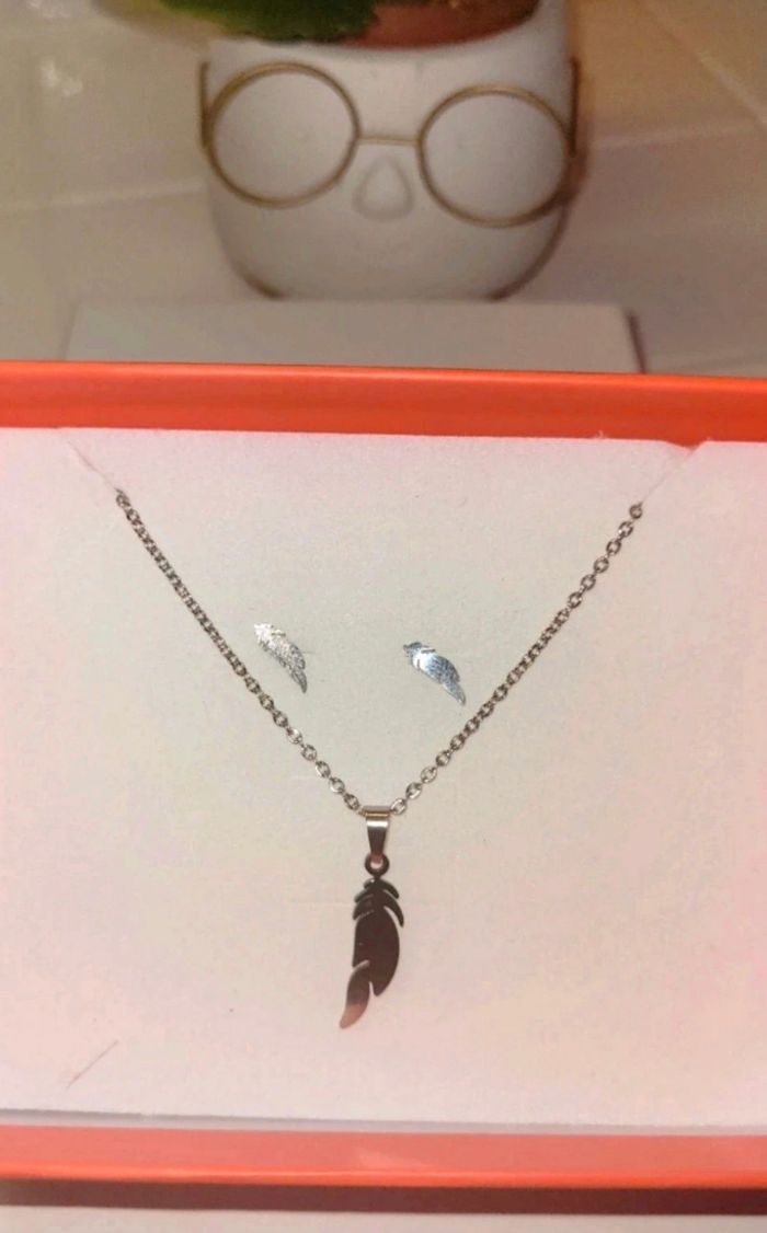 Ensemble en acier inoxydable
argenté plume - photo numéro 2