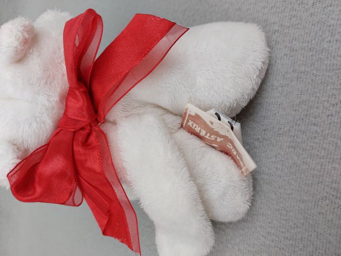 Peluche doudou chat blanc rose exclusivité PARC ASTERIX yeux bleus nœud rouge - photo numéro 5