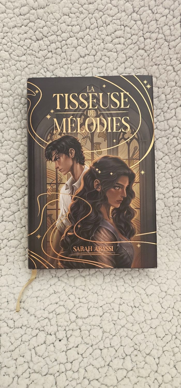La Tisseuse de Mélodies : Tome 1 de Sarah Abassi relié avec jaspage - photo numéro 1