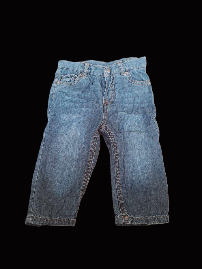 Jean Okaidi/Obaibi 12 mois