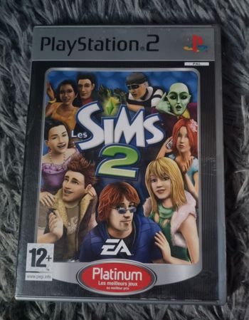 Boîte de jeu vide Les Sims 2 avec livret PS2