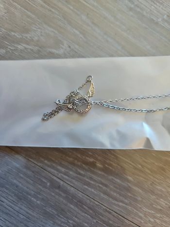 Collier neuf argenté ailes neuf