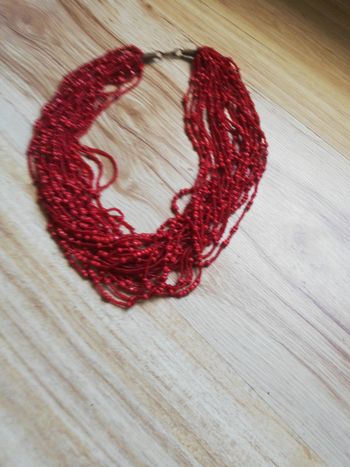 Collier perle rouge