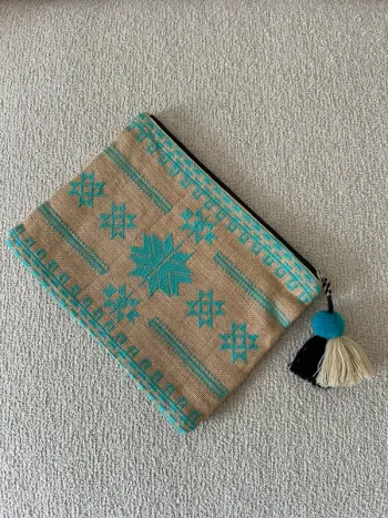 Pochette en toile de jute Mango turquoise 🦋