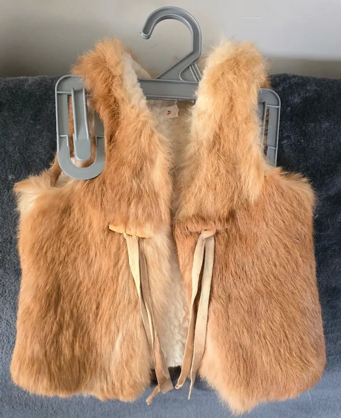 Veste sans manches fausse fourrure