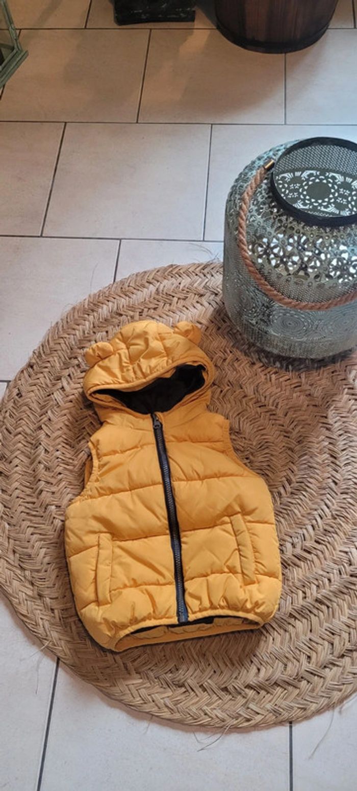 Jolie veste doudoune sans manche Taille 92
