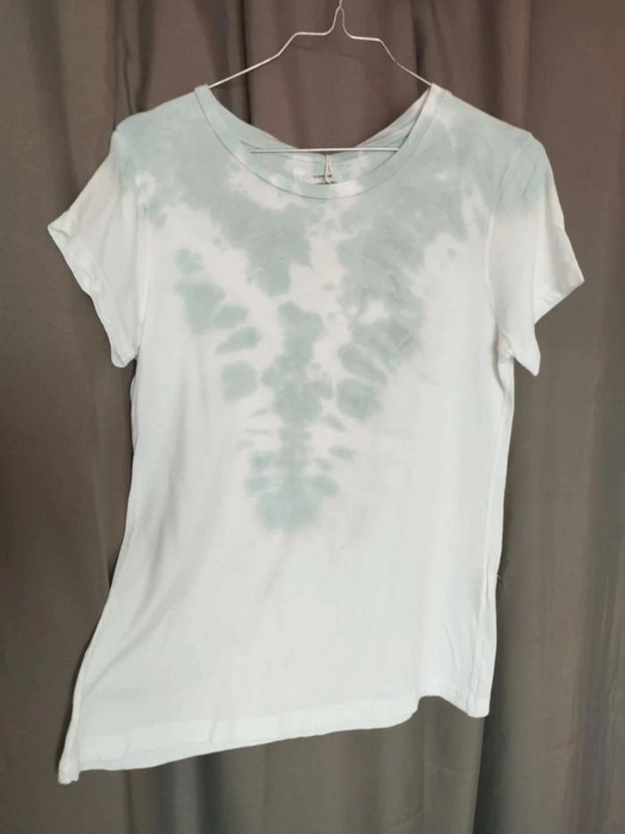 Tee-shirt . Marque system action.