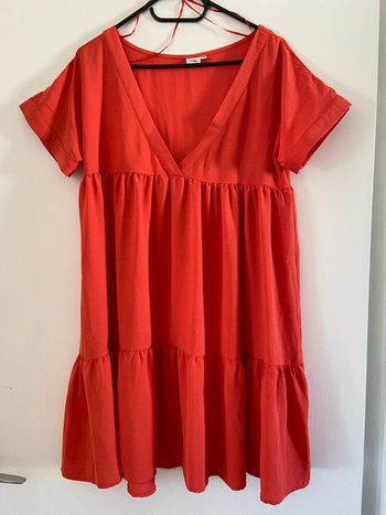 Robe patineuse corail taille M neuve