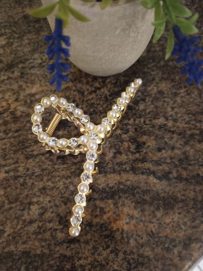 Pince à cheveux neuf