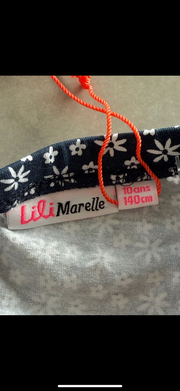 Jupe patineuse marine à fleurs 10 ans - photo numéro 5