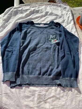 Pull tape à l’œil bleu 10 ans