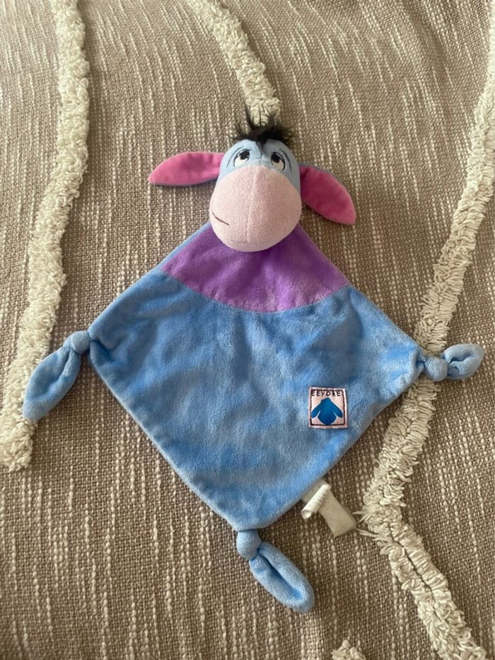 Peluche doudou plat 32cm Disney bourriquet âne bleu et violet très bon état