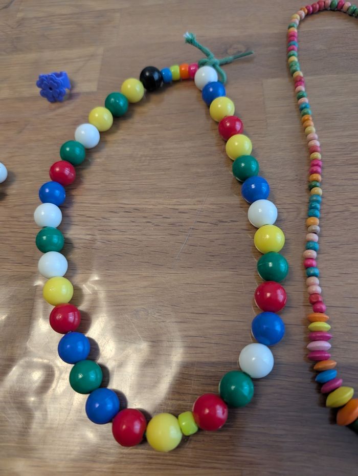 Lot de bijoux fille
2 colliers en perles bois - photo numéro 4