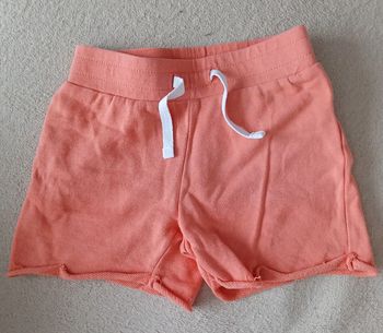 Short orange saumon kiabi 4ans