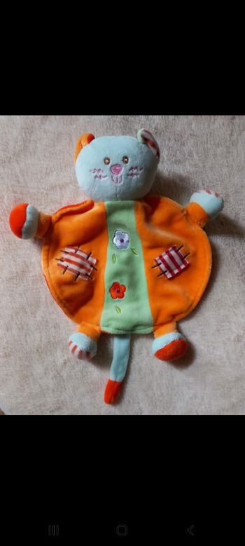 Doudou plat rond chat bleu - orange ,vert ,fleurs - Ajena