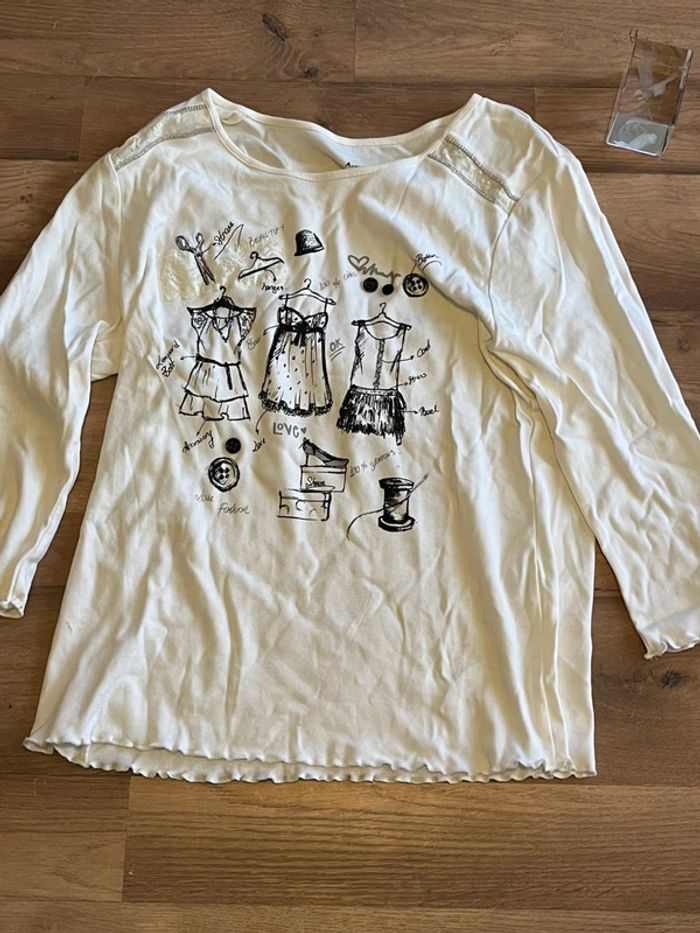 Je vend un haut manche longue femme taille 4 très bon état