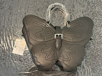 Sac noir papillon