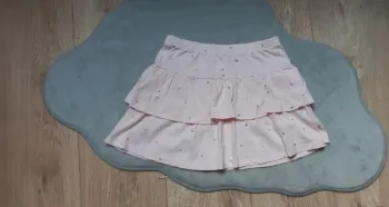 Jupe à volants h&m rose clair à cœurs 6/8 ans en très bon état