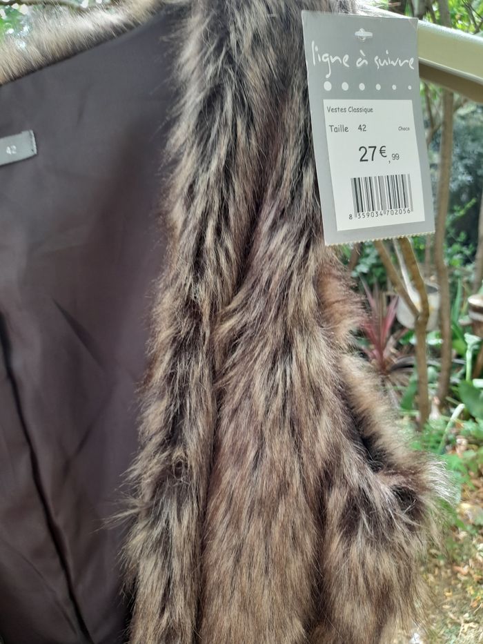 Vend veste sans manche neuve femme taille 42