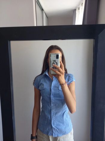 Chemise sans manches à rayures