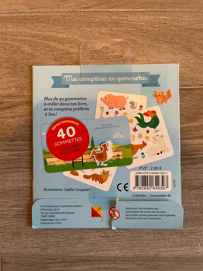 Livre et gommettes - photo numéro 2