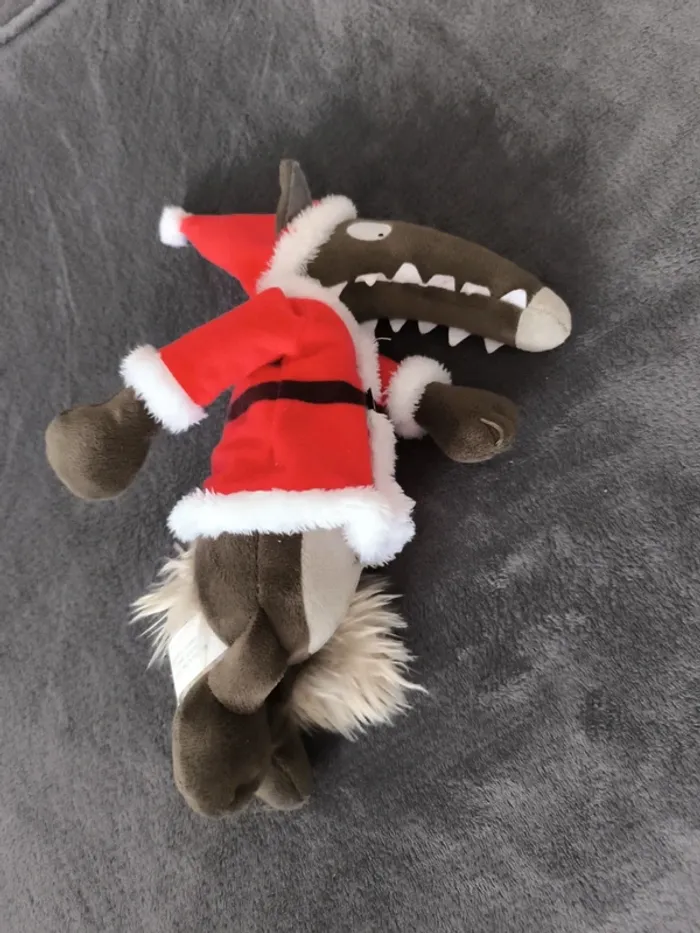 Loup père noël peluche