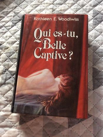 #qui es tu belle captive Kathleen E Woodiwiss. )
