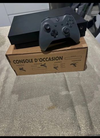 Xbox One X 1To avec manette