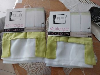 Jolie paire de voilages neuves
