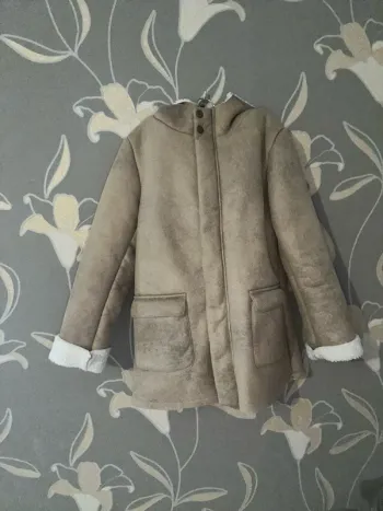 Manteau fille, dix ans  Kiabi tient chaud