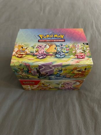 Display Pokémon Mini-tins EV8,5 Évolutions Prismatiques