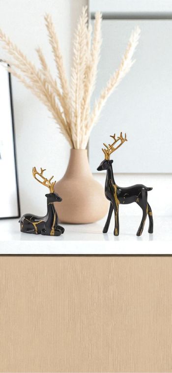 Lot de 2 cerfs décoratifs en résine