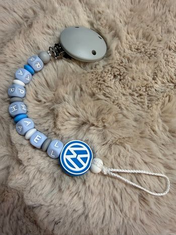 Attache tétine wolswagen