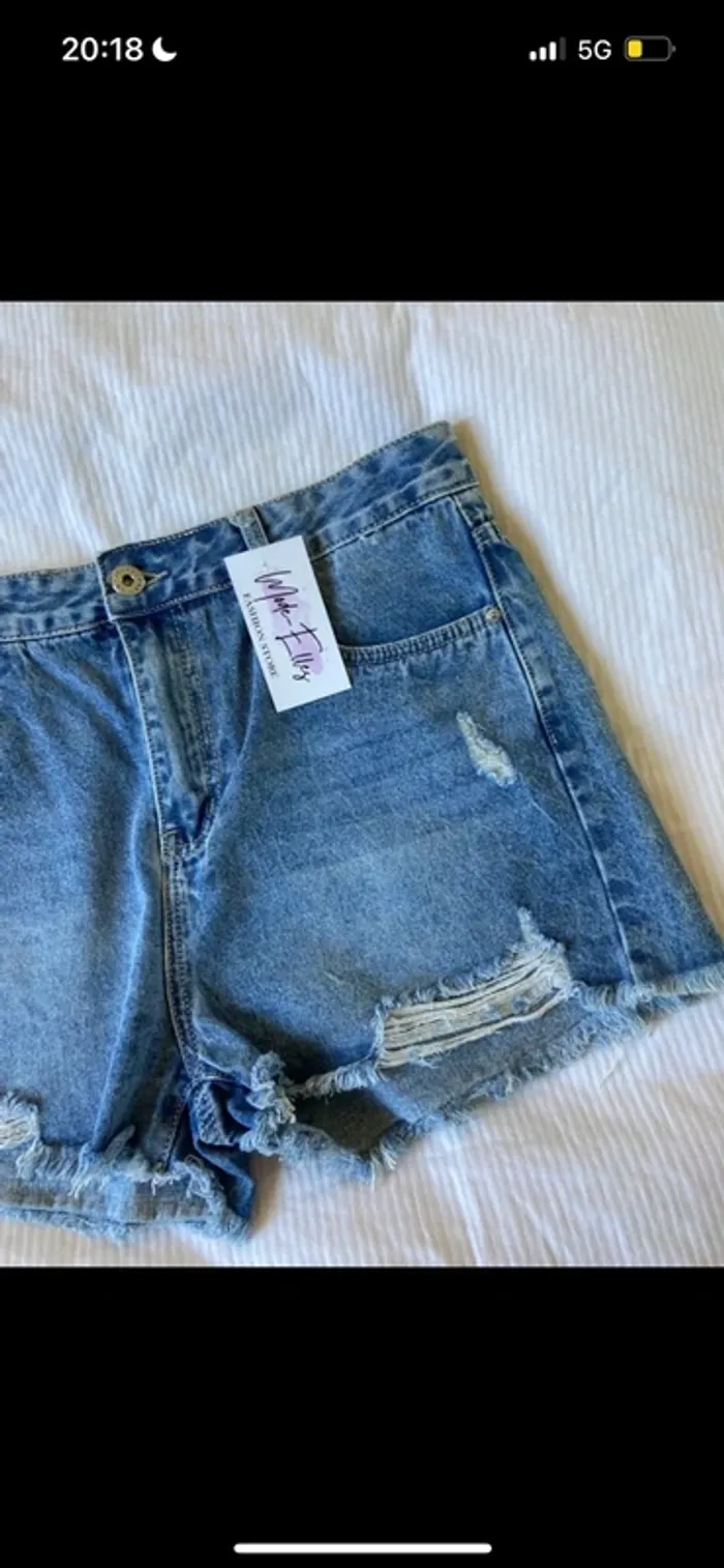 Short en jean troué - photo numéro 4