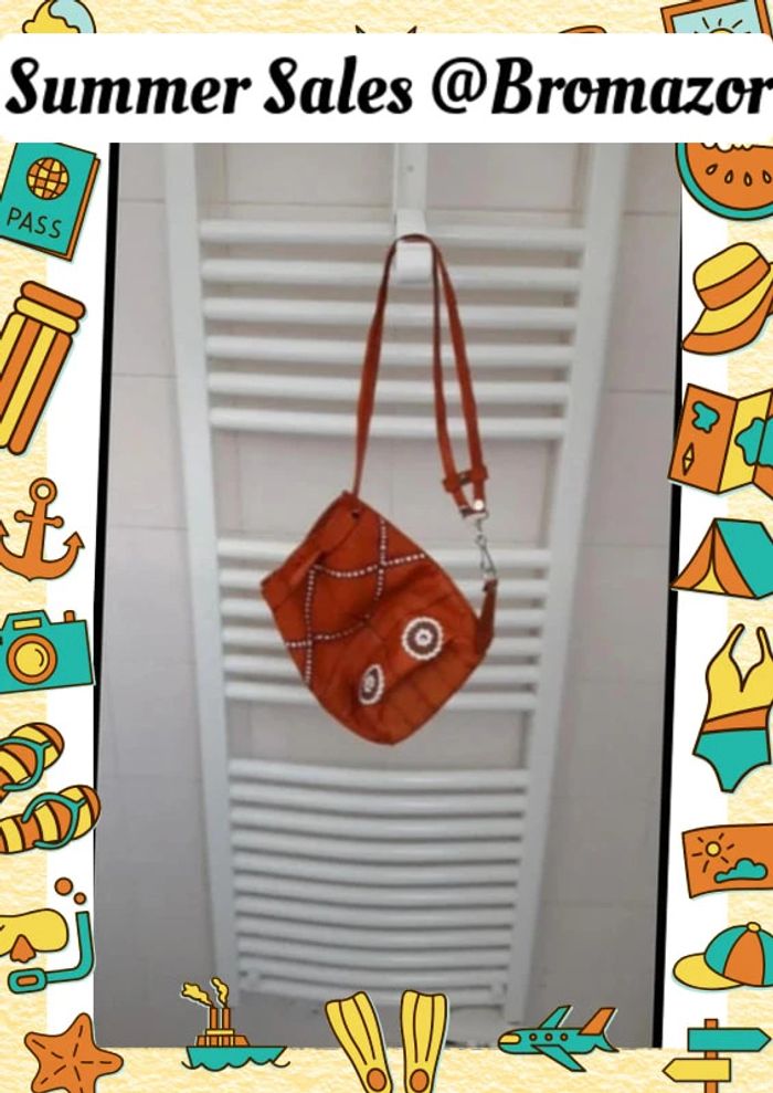 Pochette sac en cuir de chèvre