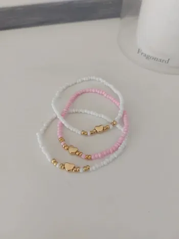 Bracelets rose et blanc en perles rocailles