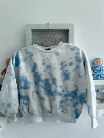Pull décoloré strass