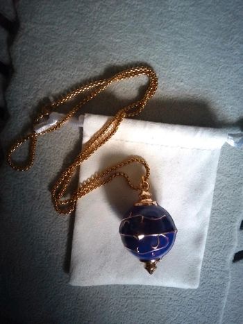 Collier pendule boule violette