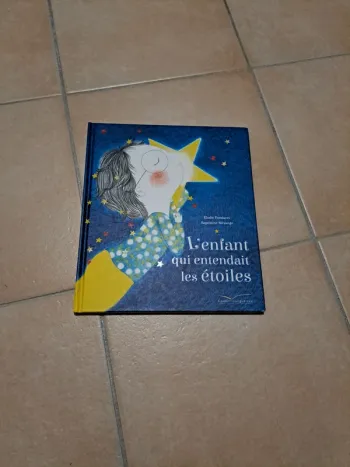 Album "l'enfant qui entendait les étoiles"