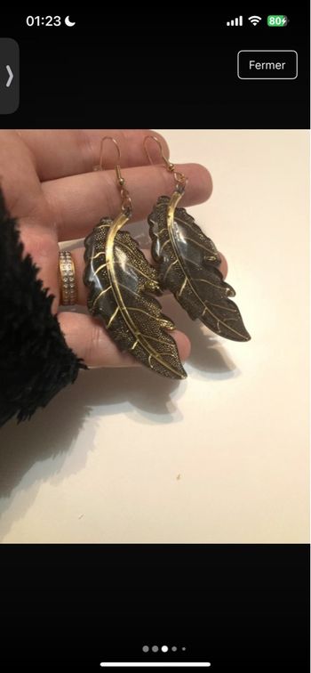 Boucles d’oreilles 🪶 NEUVES forme de plumes couleur noir et doré