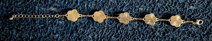 Bracelet fleurs dorée et noire - photo numéro 3