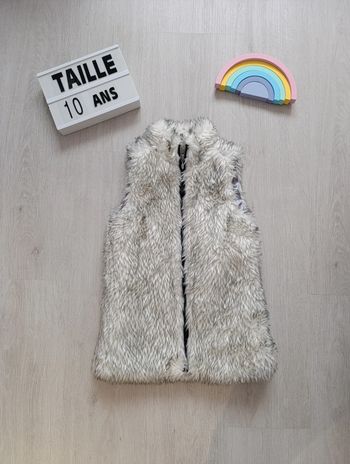 Veste sans manches avec poils taille 10ans