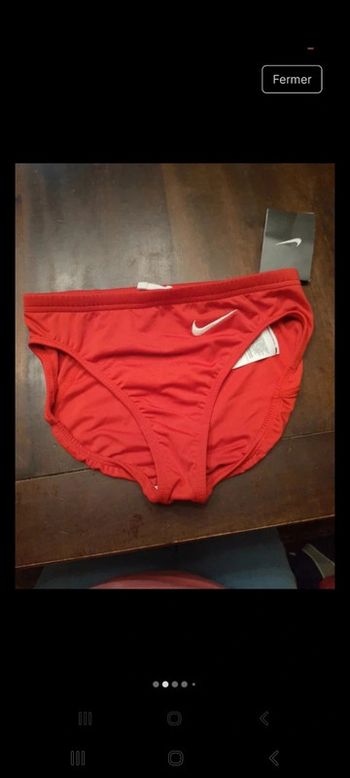 Short de course Nike rouge femme XS neuf