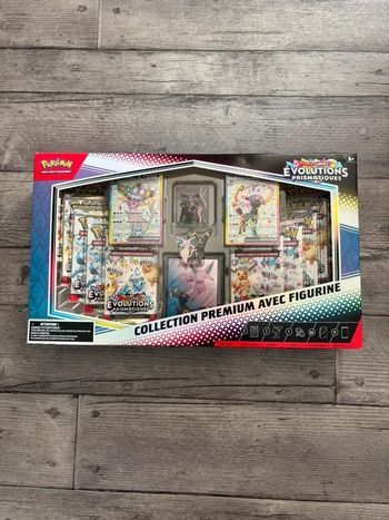 Coffret collection prenium avec figurine Évolutions Prismatiques neuf et scellé en français. 
