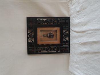 Cadre en bois avec masque africain 24 x 28 cm