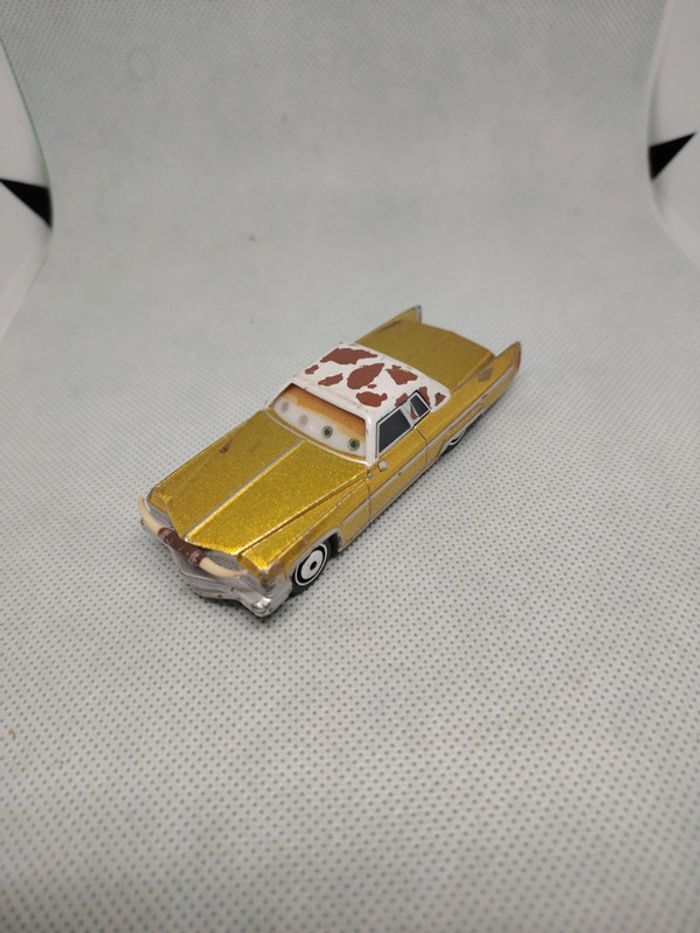 Voiture cars disney metal tex dinoco yeux lenticulaires bon état
