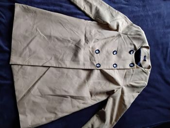 Veste jaune canard qui ne ressort pas sur la photo taille 44