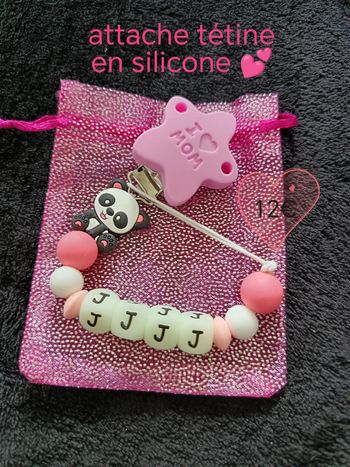 Attache tétine 